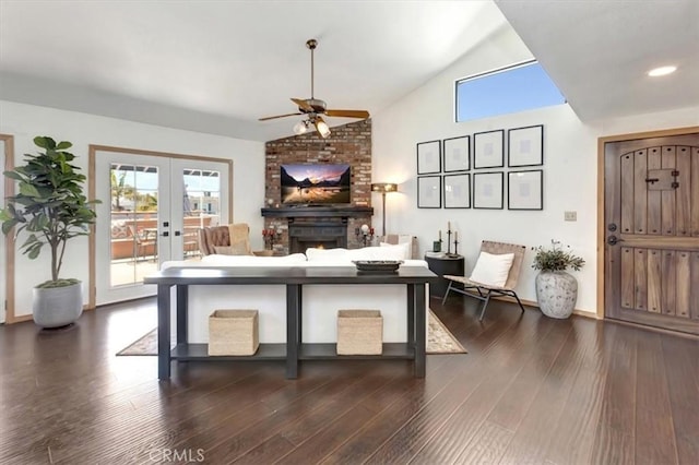 239 Nieto Ave Unit A, Long Beach, CA 90803 - living room with ceiling fan, vaulted ceiling, french doors, a fireplace, and dark wood-style flooring