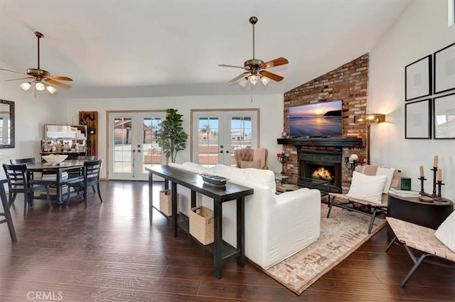 239 Nieto Ave Unit A, Long Beach, CA 90803 - living area featuring french doors, ceiling fan, vaulted ceiling, dark wood-type flooring, and a brick fireplace