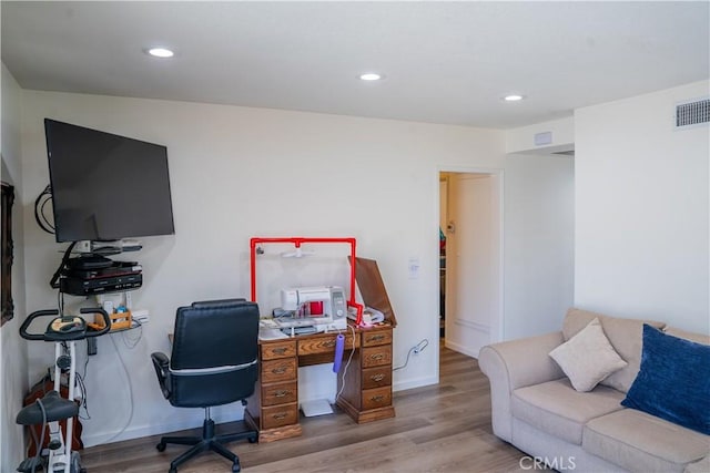 10515 Acoro St, Bellflower, CA 90706 - office area with wood finished floors and recessed lighting