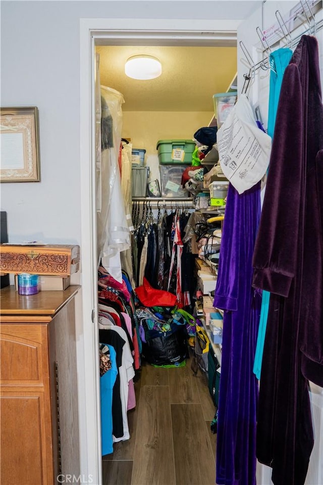 10515 Acoro St, Bellflower, CA 90706 - walk in closet featuring wood finished floors