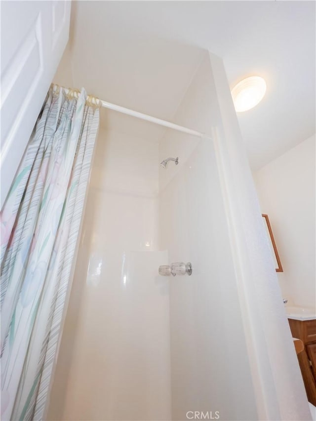 10515 Acoro St, Bellflower, CA 90706 - bathroom with a shower with curtain and vanity