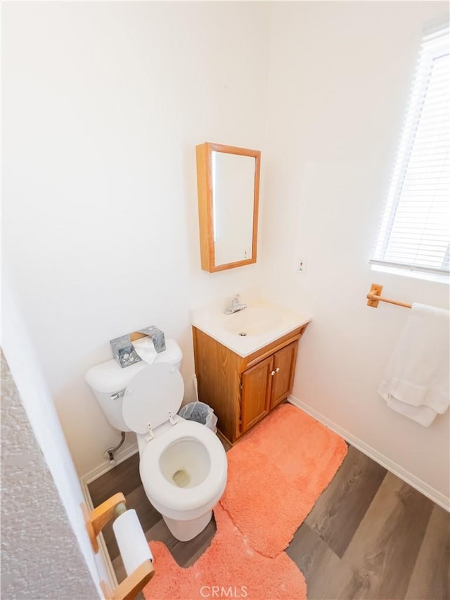 10515 Acoro St, Bellflower, CA 90706 - bathroom with wood finished floors and vanity