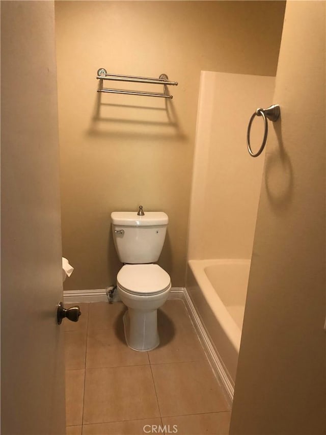 8601 International Ave Unit 236, Canoga Park, CA 91304 - bathroom featuring tile patterned flooring, a tub to relax in, and a shower