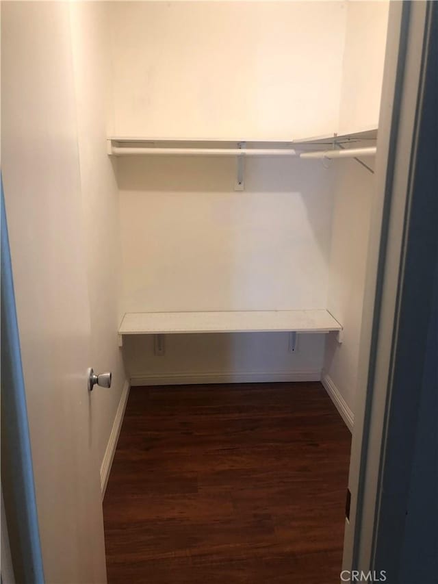 8601 International Ave Unit 236, Canoga Park, CA 91304 - spacious closet featuring dark wood finished floors