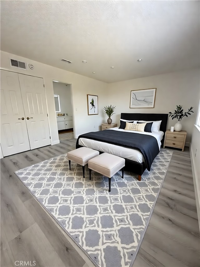 22608 Ironbark Dr, Diamond Bar, CA 91765 - bedroom featuring wood finished floors, recessed lighting, and a closet