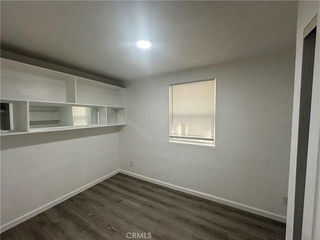 2023 Jewell Ln, Redding, CA 96001 - empty room with dark wood-type flooring and baseboards