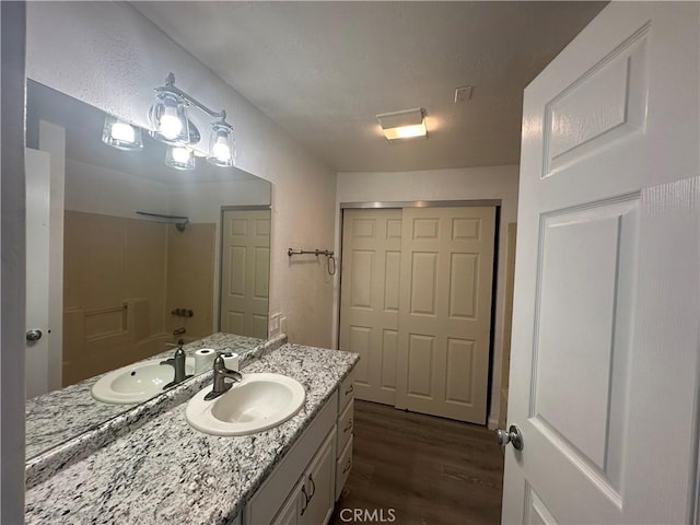 2023 Jewell Ln, Redding, CA 96001 - bathroom featuring vanity, wood finished floors, and  shower combination