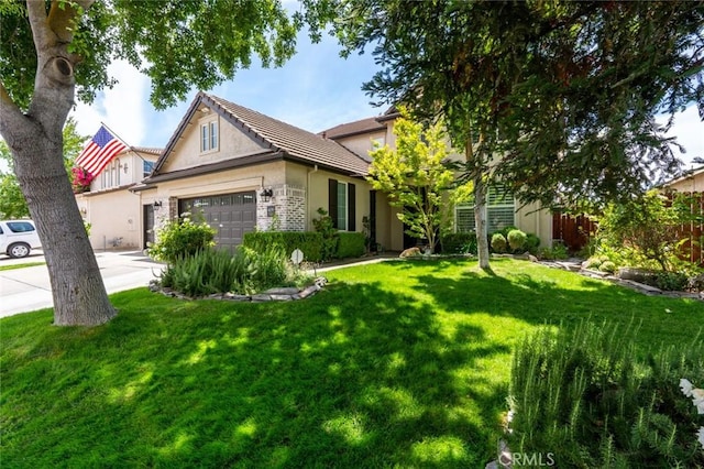 4139 Sunshine Ct, Merced, CA 95340 - view of front of property with a garage, stucco siding, driveway, and a tiled roof