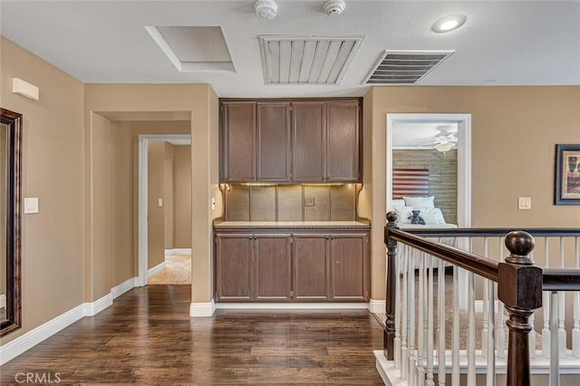 4139 Sunshine Ct, Merced, CA 95340 - kitchen featuring dark wood-style flooring, ceiling fan, and light countertops