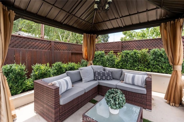 4139 Sunshine Ct, Merced, CA 95340 - fenced backyard with an outdoor hangout area, a gazebo, and a patio area