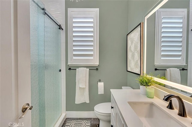 4139 Sunshine Ct, Merced, CA 95340 - bathroom featuring a stall shower, vanity, tile patterned floors, and healthy amount of natural light