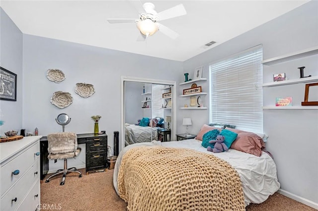 4139 Sunshine Ct, Merced, CA 95340 - bedroom featuring light carpet, an office area, a ceiling fan, and a closet