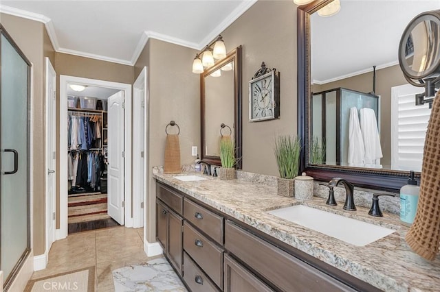 4139 Sunshine Ct, Merced, CA 95340 - full bath with a shower stall, double vanity, crown molding, and a spacious closet