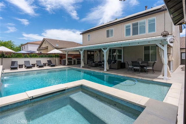 4139 Sunshine Ct, Merced, CA 95340 - view of pool with an outdoor hangout area, an in-ground hot tub, a patio, a grill, and outdoor dining space