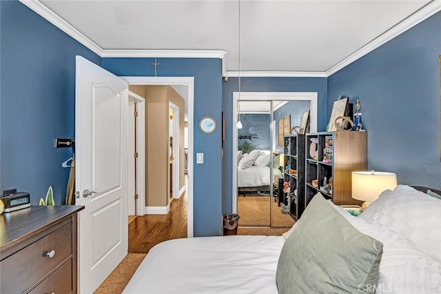 4139 Sunshine Ct, Merced, CA 95340 - bedroom with a closet, crown molding, and wood finished floors