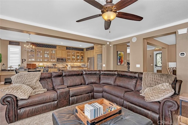 4139 Sunshine Ct, Merced, CA 95340 - living room with ceiling fan, a chandelier, and ornamental molding