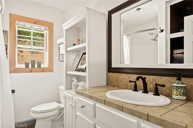 1 Sunny Slope, Running Springs, CA 92382 - full bathroom with tasteful backsplash, vanity, and a shower with shower curtain
