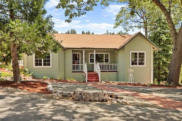 1 Sunny Slope, Running Springs, CA 92382 - single story home featuring covered porch and a shingled roof