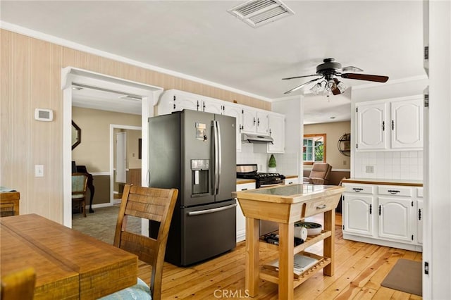 1 Sunny Slope, Running Springs, CA 92382 - kitchen with stainless steel refrigerator with ice dispenser, under cabinet range hood, white cabinetry, backsplash, and ceiling fan