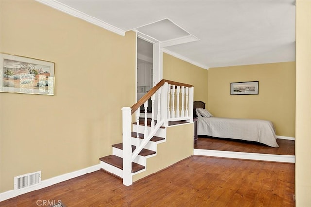 1 Sunny Slope, Running Springs, CA 92382 - stairway featuring crown molding and wood finished floors