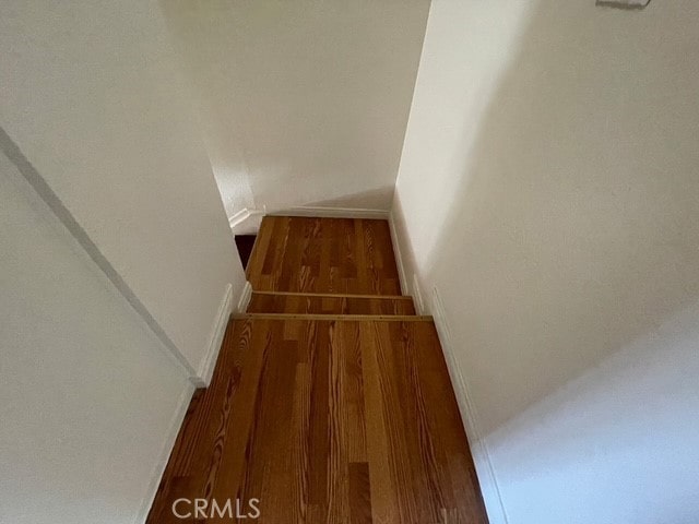 1415 El Sereno Ave Unit 4, Pasadena, CA 91103 - staircase with wood finished floors and vaulted ceiling
