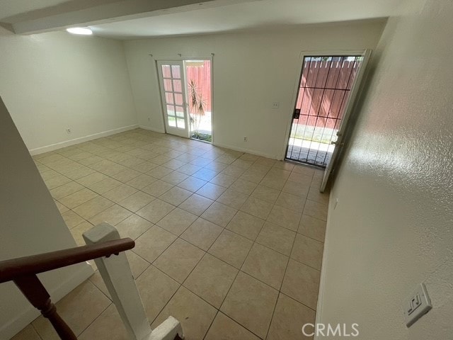 1415 El Sereno Ave Unit 4, Pasadena, CA 91103 - empty room with light tile patterned floors and baseboards