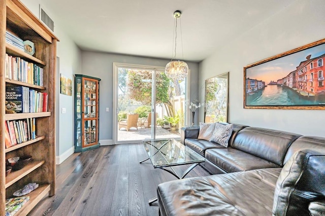 6847 Adolphia Dr, Carlsbad, CA 92011 - living room featuring hardwood / wood-style floors and a chandelier