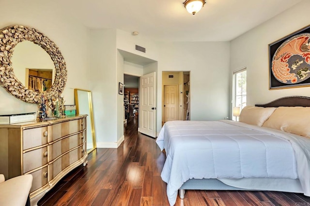 6847 Adolphia Dr, Carlsbad, CA 92011 - bedroom featuring dark wood-style flooring and baseboards