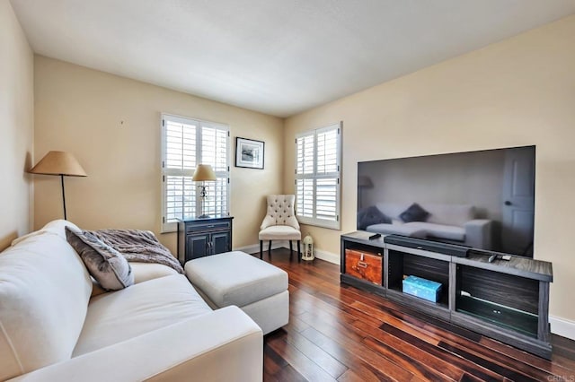 6847 Adolphia Dr, Carlsbad, CA 92011 - living area featuring dark wood-style floors and baseboards