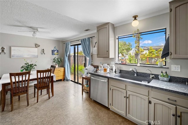 1246 15th St, Los Osos, CA 93402 - kitchen with dishwasher, ceiling fan, light floors, crown molding, and dark countertops