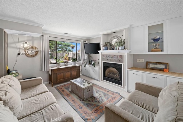 1246 15th St, Los Osos, CA 93402 - living room featuring a textured ceiling, a fireplace, crown molding, and light colored carpet