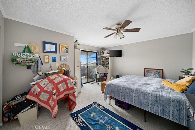 1246 15th St, Los Osos, CA 93402 - bedroom with ornamental molding, access to outside, a textured ceiling, carpet, and a ceiling fan