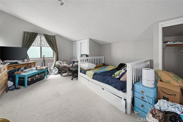 1246 15th St, Los Osos, CA 93402 - bedroom with a textured ceiling, carpet flooring, and lofted ceiling