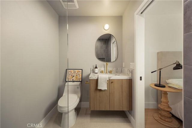3499 San Rafael Cir, Costa Mesa, CA 92626 - bathroom featuring baseboards and vanity
