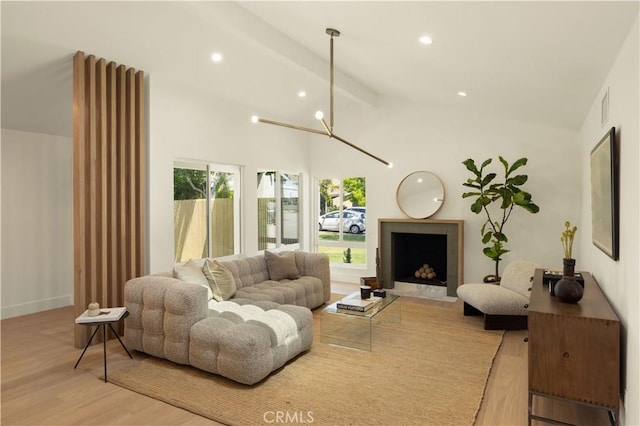 3499 San Rafael Cir, Costa Mesa, CA 92626 - living room with light wood-type flooring, recessed lighting, and a fireplace