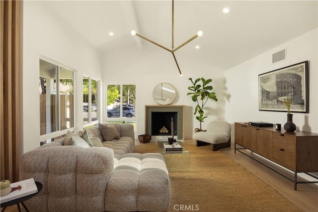 3499 San Rafael Cir, Costa Mesa, CA 92626 - living area with wood finished floors, high vaulted ceiling, and recessed lighting