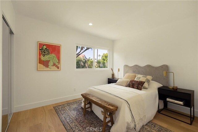 3499 San Rafael Cir, Costa Mesa, CA 92626 - bedroom with light wood-style floors and recessed lighting