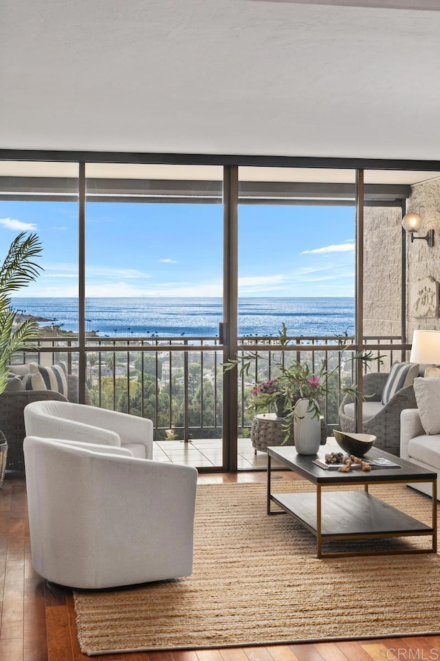 2500 Torrey Pines Rd Unit 1101, La Jolla, CA 92037 - living room with expansive windows, a water view, and wood-type flooring