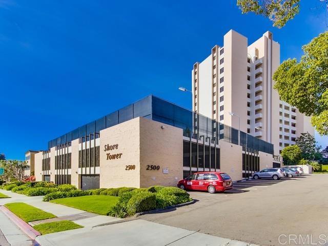 2500 Torrey Pines Rd Unit 1101, La Jolla, CA 92037 - view of apartment building / complex with uncovered parking