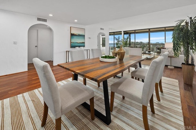 2500 Torrey Pines Rd Unit 1101, La Jolla, CA 92037 - dining area with arched walkways, wood finished floors, recessed lighting, and floor to ceiling windows