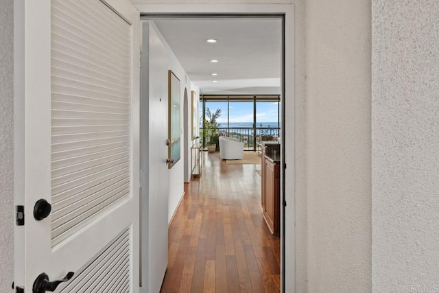 2500 Torrey Pines Rd Unit 1101, La Jolla, CA 92037 - hall with hardwood / wood-style floors, recessed lighting, and floor to ceiling windows