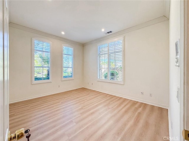 43097 Calle Camellia, Temecula, CA 92592 - empty room featuring crown molding, plenty of natural light, light wood-style floors, and recessed lighting