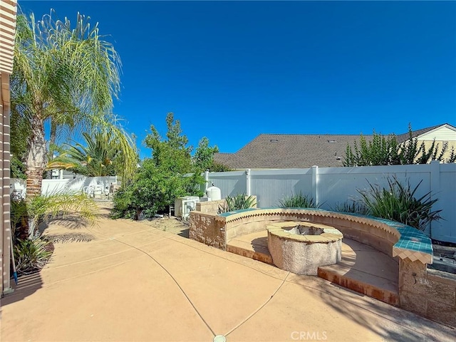 43097 Calle Camellia, Temecula, CA 92592 - fenced backyard featuring an outdoor fire pit and a patio