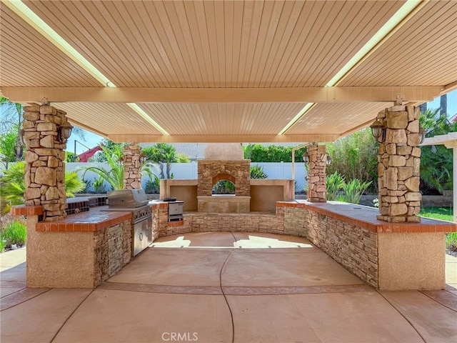 43097 Calle Camellia, Temecula, CA 92592 - view of patio with an outdoor kitchen and exterior fireplace
