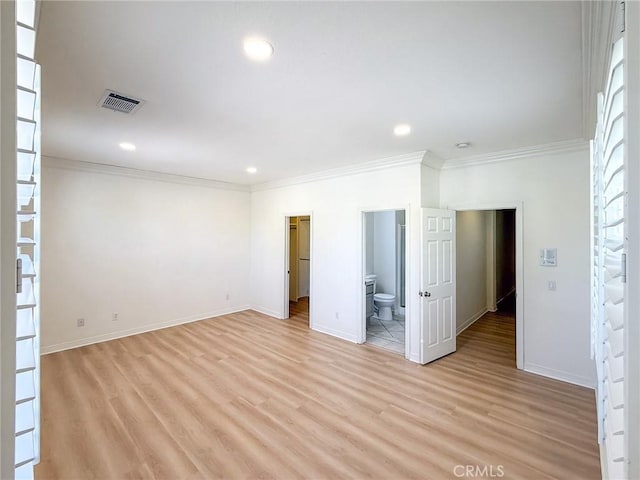 43097 Calle Camellia, Temecula, CA 92592 - unfurnished bedroom with crown molding, light wood-style floors, recessed lighting, a walk in closet, and ensuite bath