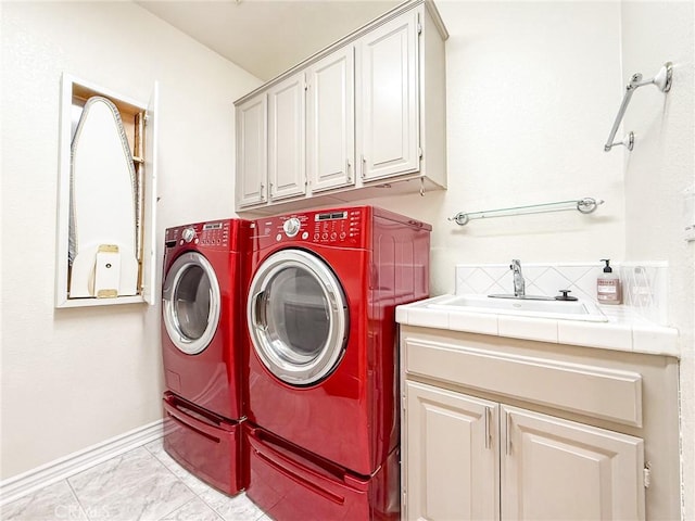 43097 Calle Camellia, Temecula, CA 92592 - laundry area with cabinet space, washer and clothes dryer, and light marble finish flooring