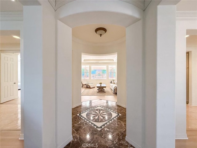 43097 Calle Camellia, Temecula, CA 92592 - hallway featuring marble tiled floors, inlaid floor details, and crown molding
