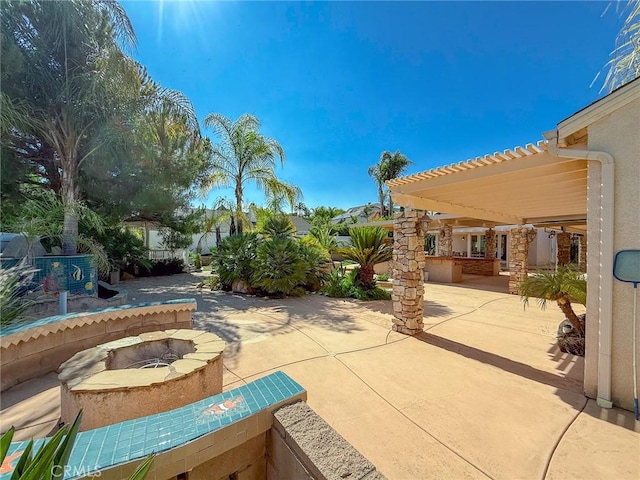 43097 Calle Camellia, Temecula, CA 92592 - view of patio / terrace with an outdoor fire pit