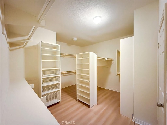 43097 Calle Camellia, Temecula, CA 92592 - walk in closet with wood finished floors