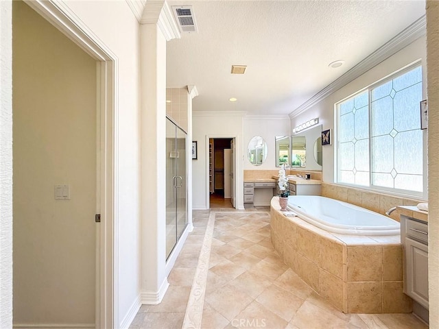 43097 Calle Camellia, Temecula, CA 92592 - bathroom with vanity, a shower stall, crown molding, a bath, and tile patterned floors
